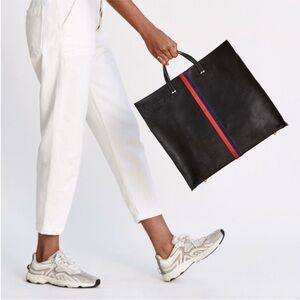 CLARE V. Simple Stripe
Perforated Leather Tote. Black w/ Navy and Red Stripe